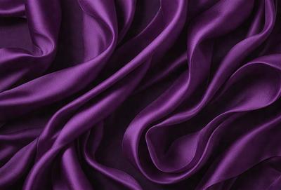 Purple fabric with a flowing pattern.