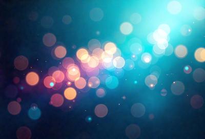 The primary subject of the image is a brightly colored, swirling pattern of lights. The setting is a dark background, which contrasts with the vibrant colors of the lights. The visual style is a combination of digital art and illustration, creating a dynamic and eye-catching effect. The colors and mood of the image are predominantly blue and green, giving it a calming and serene atmosphere.