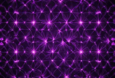 The primary subject of the image is a purple background with a pattern of purple stars. The setting is a dark background, which contrasts with the bright purple stars. The visual style is a digital art or illustration, as the purple stars are arranged in a visually appealing manner. The colors and mood of the image are predominantly purple, creating a sense of calmness and tranquility.