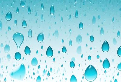 The primary subject of the image is a blue sky filled with water droplets. The setting is a clear blue sky, and the visual style is a photo. The colors and mood of the image are predominantly blue, creating a serene and calming atmosphere.