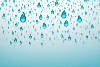The primary subject of the image is a large number of raindrops falling on a blue background. The setting is a cloudy sky, and the visual style is a photo. The dominant colors are blue and white, creating a calm and serene atmosphere.