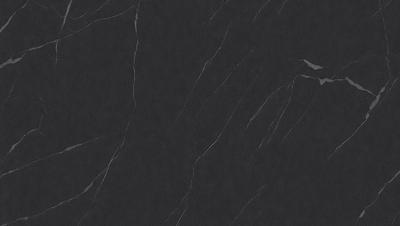 The primary subject of the image is a black marble countertop. The setting is a kitchen, with the countertop being the main focus of the scene. The visual style is a photo, capturing the marble countertop in detail. The colors and mood of the image are predominantly dark, with the black marble countertop being the main element that stands out.
