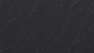 The primary subject of the image is a black marble countertop. The setting is a kitchen, with the countertop being the main focus of the scene. The visual style is a close-up of the marble countertop, showcasing its texture and appearance. The colors and mood of the image are predominantly dark, with the black marble countertop being the main source of contrast and visual interest.