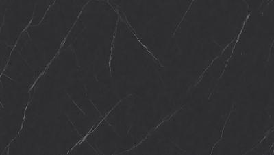 The primary subject of the image is a black marble countertop. The setting is a kitchen, with the countertop being the main focus of the scene. The visual style is a close-up of the marble countertop, showcasing its texture and pattern. The colors and mood of the image are predominantly dark, with the black marble countertop being the main source of contrast.
