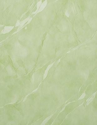 The primary subject of the image is a green marble wall. The setting is a room with a green marble wall as the main focus. The visual style is a close-up of the marble wall, showcasing its texture and color. The colors and mood of the image are predominantly green, giving the space a calm and serene atmosphere.