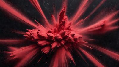 The primary subject of the image is a close-up of a red, pink, and white splatter pattern, which appears to be a painting or a digital artwork. The setting is a dark background, which contrasts with the vibrant colors of the splatter pattern. The visual style is a mix of digital art and painting, creating a unique and eye-catching piece. The dominant colors in the image are red, pink, and white, which evoke a sense of energy and creativity.