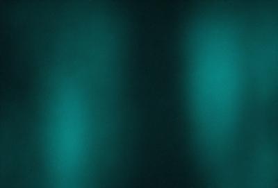 The primary subject of the image is a blue wall with a patterned design. The setting is a dark room, and the visual style appears to be a digital art or illustration. The dominant colors in the image are blue and black, creating a moody atmosphere.