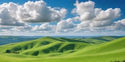 The image features a lush green hillside with a cloudy blue sky above. The landscape is filled with green grass and a few clouds scattered throughout the scene. The primary subject is the beautiful, grassy hillside, which is the main focus of the image. The setting is a serene, natural environment, and the visual style is a realistic, natural representation of the landscape. The colors and mood of the image are predominantly green and serene, creating a peaceful and calming atmosphere.