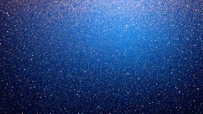 The primary subject of the image is a blue sky filled with stars. The setting is a night sky, and the visual style is a photo. The colors and mood of the image are predominantly blue and serene, creating a peaceful and tranquil atmosphere.