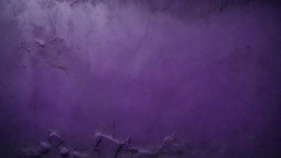 Purple wall with a hole in it.