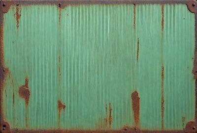 The primary subject of the image is a green metal surface with a pattern of stripes. The setting is an outdoor environment, possibly a wall or a metal surface. The visual style is a photo, capturing the details of the green metal surface. The colors and mood of the image are predominantly green, with a slightly rusty appearance, giving it a slightly aged and weathered look.