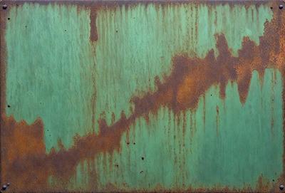 The primary subject of the image is a green metal surface with rust stains and streaks. The setting is an outdoor environment, possibly a metal surface in a park or a similar location. The visual style is a close-up of the metal surface, showcasing the rust and stains. The colors and mood of the image are predominantly green, with the rust adding a touch of brown and red.