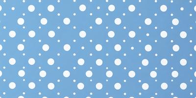 The primary subject of the image is a blue background with white snowflakes scattered across it. The setting appears to be a winter scene, possibly a snowy landscape or a winter-themed design. The visual style of the image is a combination of a photo and a digital art or illustration, as the snowflakes are depicted in a patterned manner. The dominant colors in the image are blue and white, creating a calm and serene atmosphere.