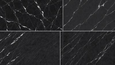 The image features a close-up of a marble countertop with a black and white pattern. The countertop is made of marble, giving it a luxurious and elegant appearance. The pattern on the countertop is a combination of black and white, which adds visual interest and contrast to the overall design. The marble countertop is likely found in a high-end setting, such as a restaurant or a luxury home.