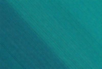 The primary subject of the image is a blue background with a pattern of vertical lines. The setting is a large, open space with a blue sky visible in the background. The visual style is a combination of a photo and a digital art, creating a unique and interesting pattern. The colors and mood of the image are predominantly blue, giving it a calm and serene atmosphere.