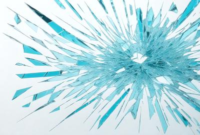 The primary subject of the image is a large, shattered piece of glass. The setting is a white background, which provides a clean and minimalistic environment. The visual style is a combination of photo and digital art, creating a unique and intriguing appearance. The colors and mood of the image are predominantly blue, giving it a calm and serene atmosphere.