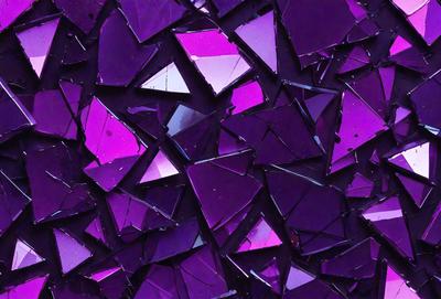 The primary subject of the image is a close-up of a purple glass shard. The setting is a purple background, which creates a visually striking contrast with the glass. The visual style is a close-up of a glass shard, showcasing its texture and details. The colors and mood of the image are predominantly purple, giving it a unique and artistic appearance.