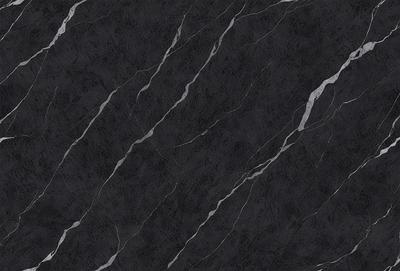 The primary subject of the image is a black marble countertop. The setting is a kitchen, with the countertop being the main focus of the scene. The visual style is a close-up of the marble countertop, showcasing its texture and pattern. The colors and mood of the image are predominantly dark, with the black marble countertop being the main source of contrast.