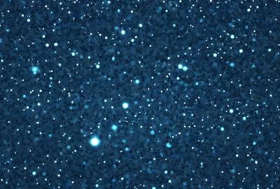 The primary subject of the image is a blue starry sky filled with bright stars. The setting is a dark, star-filled night sky, creating a sense of depth and mystery. The visual style is a combination of a photo and digital art, as the image captures the beauty of the night sky while also showcasing the intricate patterns of the stars. The colors and mood of the image are predominantly blue, with the stars adding a touch of white and sparkling light.