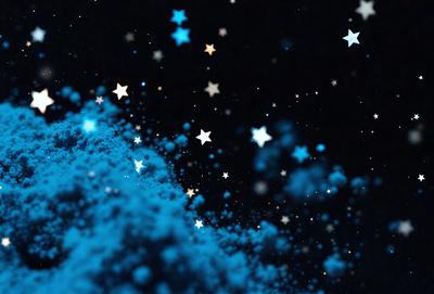 The primary subject of the image is a blue and white starry background. The setting is a dark, star-filled sky, with the stars appearing as blue and white specks. The visual style is a combination of a photo and digital art, creating a unique and captivating atmosphere. The colors and mood of the image are predominantly blue and white, with a sense of wonder and awe.