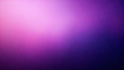 The primary subject of the image is a purple background. The setting is a dark, purple-colored room. The visual style is a close-up of the purple background, which creates a moody and atmospheric mood.