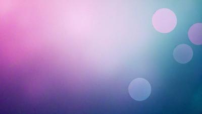 The primary subject of the image is a blue background with a pattern of circles. The setting is a purple sky, and the visual style appears to be a digital art or illustration. The dominant colors are blue and purple, creating a calm and serene atmosphere.