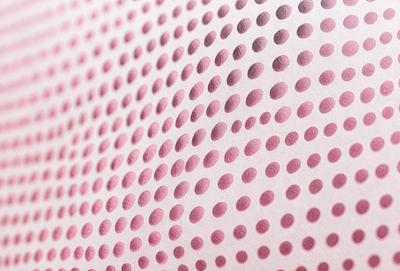 The primary subject of the image is a pattern of dots, which are pink in color. The setting is a white background, and the visual style appears to be a digital art or illustration. The dominant colors are pink and white, creating a calm and soothing atmosphere.