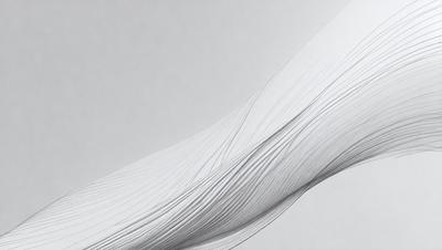 The primary subject of the image is a close-up of a white, wavy line. The setting is a white background, which creates a clean and minimalist visual style. The image appears to be a digital art or illustration, as it features a smooth and continuous line. The colors and mood of the image are predominantly white, giving it a calm and serene atmosphere.
