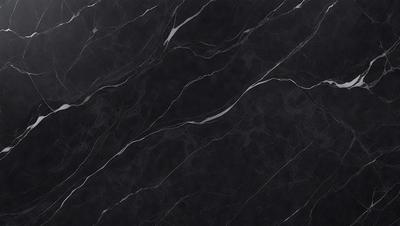The primary subject of the image is a black marble countertop. The setting is a kitchen, with the countertop being the main focus of the scene. The visual style is a close-up of the marble countertop, showcasing its texture and pattern. The colors and mood of the image are predominantly dark, with the black marble countertop being the main source of contrast.