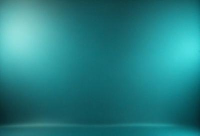 The primary subject of the image is a blue background with a light shining on it. The setting appears to be a dark room, and the visual style is a photo. The dominant colors are blue and white, creating a calm and serene atmosphere.