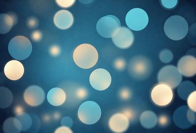 The primary subject of the image is a blue background with a pattern of white lights. The setting appears to be a nighttime scene, possibly a cityscape or a festive event. The visual style is a combination of digital art and illustration, creating a unique and eye-catching design. The colors and mood of the image are predominantly blue and white, with a sense of calmness and tranquility.