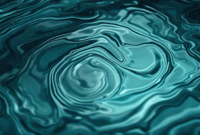 The primary subject of the image is a blue body of water, possibly a lake or a pool. The water appears to be rippling and has a reflective surface. The setting is outdoors, with the water being the main focus of the scene. The visual style of the image is a close-up of the water, showcasing its ripples and reflections. The colors in the image are predominantly blue, creating a calm and serene atmosphere.