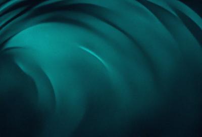 The primary subject of the image is a blue and green swirl pattern. The setting is a dark blue background, which creates a contrasting effect with the swirl pattern. The visual style appears to be a digital art or illustration, as the swirl pattern is intricately detailed and the colors are vibrant. The dominant colors are blue and green, giving the image a calming and soothing atmosphere.