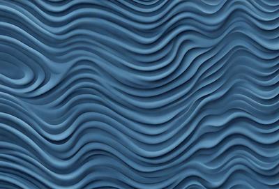 The primary subject of the image is a blue, textured wall with a patterned design. The setting is a room with a blue wall, and the visual style is a photo. The dominant colors are blue and white, creating a calm and soothing atmosphere.