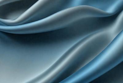 The primary subject of the image is a blue fabric, which is the main object, scene, or focus of the image. The setting or background is a blue cloth, and the visual style is a photo. The dominant colors and overall atmosphere are blue and calm.