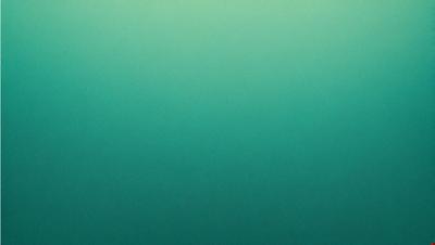The primary subject of the image is a large body of water, which appears to be a deep blue color. The setting is a vast, open ocean, with no visible land or other objects in the background. The visual style of the image is a close-up of the water, showcasing its depth and beauty. The colors and mood of the image are serene and calming, as the deep blue water evokes a sense of tranquility and vastness.