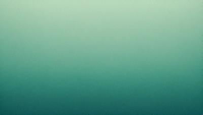The primary subject of the image is a large body of water, which appears to be a deep blue color. The water is the main focus of the image, and it is the setting in which the background is visible. The visual style of the image is a photo, capturing the natural beauty of the water. The colors and mood of the image are serene and calming, with the deep blue water creating a sense of tranquility and peacefulness.