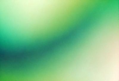 The primary subject of the image is a green background with a pattern of green and yellow stripes. The setting is a wall, and the visual style is a photo. The colors and mood of the image are predominantly green and yellow, creating a vibrant and lively atmosphere.