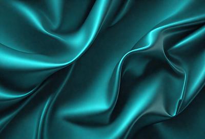 The primary subject of the image is a blue fabric, which appears to be a piece of silk. The setting is a dark background, which contrasts with the blue fabric. The visual style is a close-up of the fabric, showcasing its texture and color. The colors and mood of the image are predominantly blue, creating a calm and serene atmosphere.