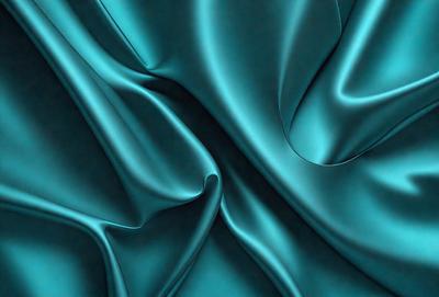 The primary subject of the image is a blue fabric, which is the main object, scene, or focus of the image. The setting or background is a blue cloth, and the visual style is a photo. The dominant colors and overall atmosphere are blue and purple, creating a serene and calming mood.
