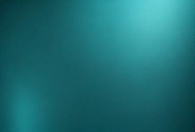 The primary subject of the image is a blue background with a darker blue color. The setting is a dark blue sky, and the visual style is a photo. The colors and mood of the image are predominantly dark and moody, with the blue hues creating a sense of depth and tranquility.