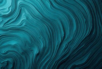 The primary subject of the image is a blue, swirling, and textured surface, which appears to be a piece of art or a digital illustration. The setting or background is a dark blue, possibly a night sky or a deep ocean. The visual style suggests that the image is a digital art or illustration, with a focus on the swirling patterns and the rich blue color. The overall atmosphere of the image is one of depth, mystery, and artistic expression.