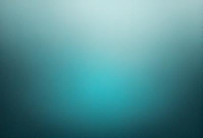 The primary subject of the image is a large body of water, which appears to be a deep blue ocean. The setting is a vast, open space with no visible land or other objects. The visual style is a close-up of the water, showcasing its depth and beauty. The colors and mood of the image are serene and calming, with the deep blue water evoking a sense of tranquility and vastness.