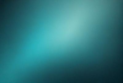 The primary subject of the image is a blue wall with a green tint. The setting is a room with a blue background. The visual style is a close-up of the wall, showcasing the blue and green tones. The colors and mood of the image are calming and serene, with the blue and green hues creating a peaceful atmosphere.