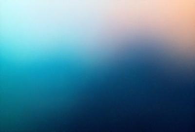 The primary subject of the image is a blue sky with clouds. The setting is a vast, open space with a blue background. The visual style is a photo of the sky, showcasing the beauty of the clouds. The colors and mood are predominantly blue, creating a serene and peaceful atmosphere.