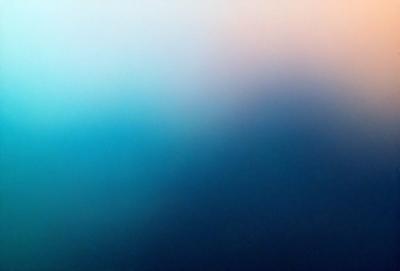 The primary subject of the image is a blue sky with clouds. The setting is a clear day with a blue sky, and the visual style is a photo. The colors and mood of the image are predominantly blue, creating a calm and serene atmosphere.