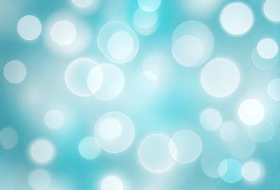 The primary subject of the image is a blue background with a pattern of white circles. The setting is a blue sky, and the visual style is a digital art or illustration. The dominant colors are blue and white, creating a calm and serene atmosphere.
