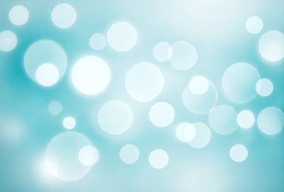 The primary subject of the image is a blue background with a pattern of white bubbles. The setting is a cloudy sky, and the visual style is a digital art or illustration. The dominant colors are blue and white, creating a calm and serene atmosphere.