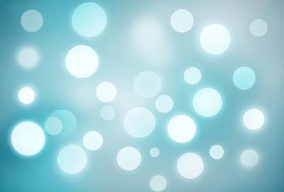 The primary subject of the image is a blue background with a pattern of white circles. The setting appears to be a space or an artistic environment. The visual style is a combination of a photo and digital art, creating a unique and interesting pattern. The dominant colors are blue and white, giving the image a calm and serene atmosphere.