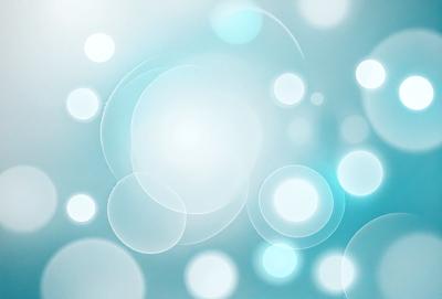 The primary subject of the image is a blue background with a pattern of white bubbles. The setting appears to be a space or an artistic environment. The visual style is a combination of a photo and digital art, creating a unique and interesting pattern. The dominant colors are blue and white, giving the image a calm and serene atmosphere.